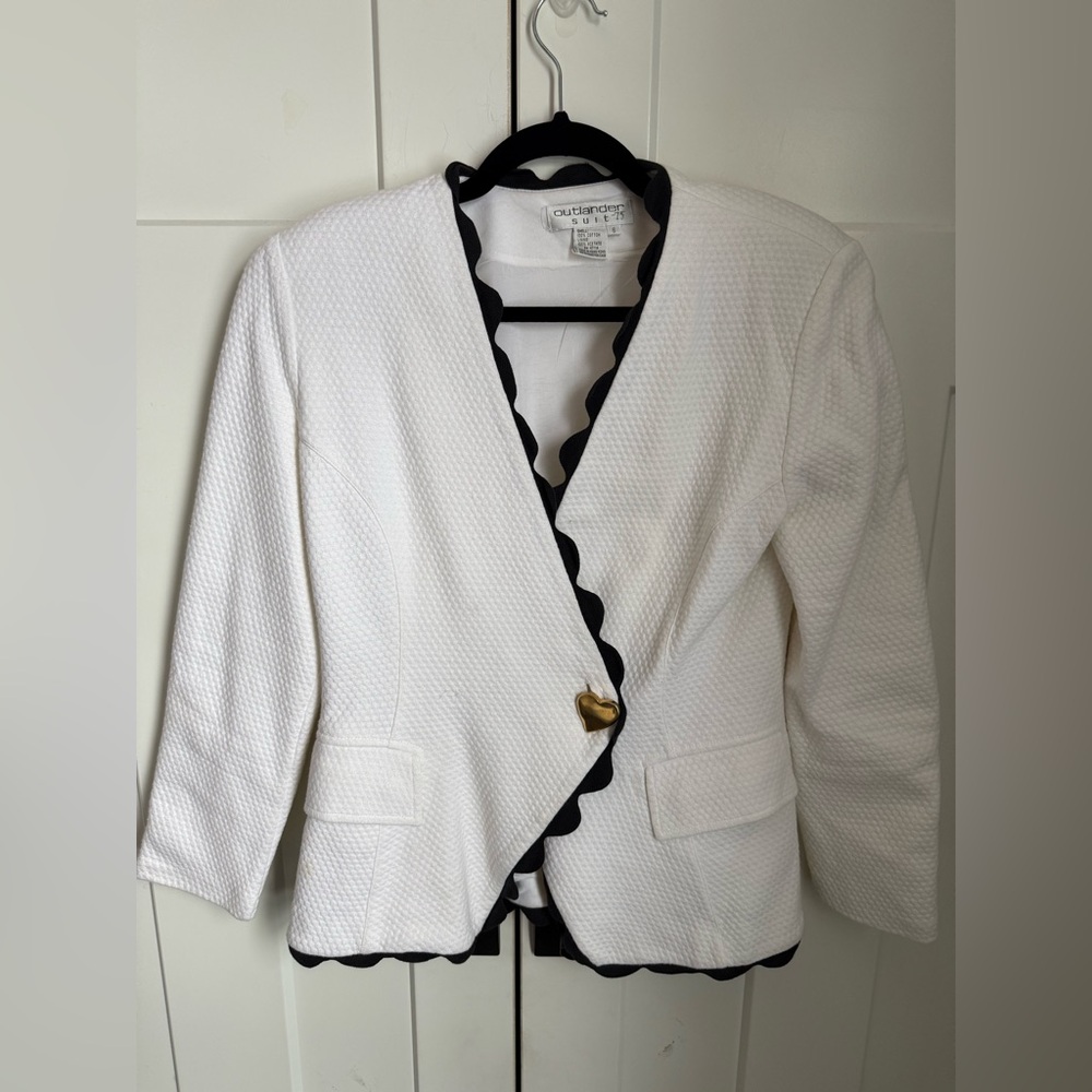 Vintage Outlander White Jacket with Black Scallop Trim and gold heart button. 6